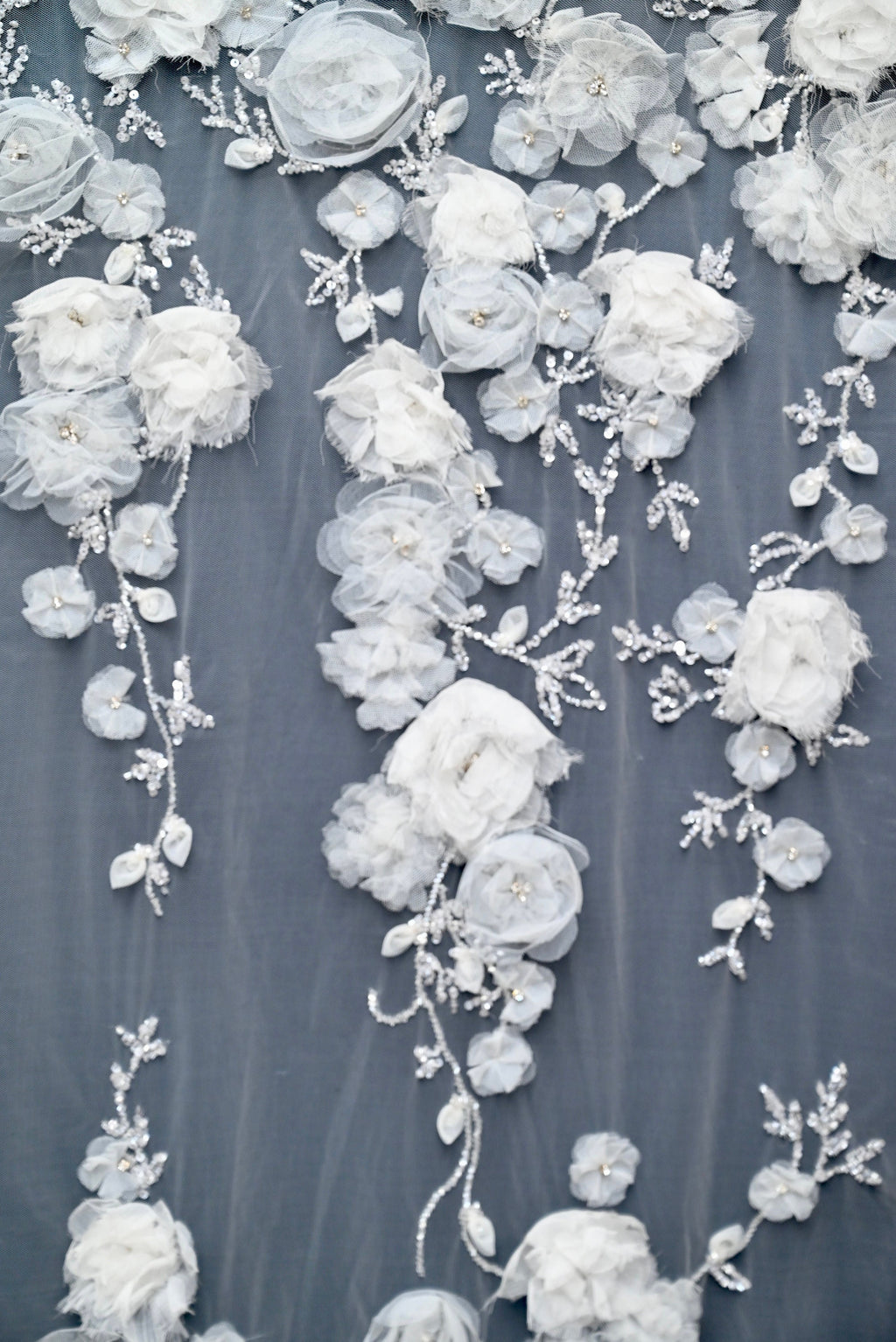 Handmade Luxurious fabric with special hand cut 3d floral applique, individually crafted for an exquisite bridal dress, gown. prom