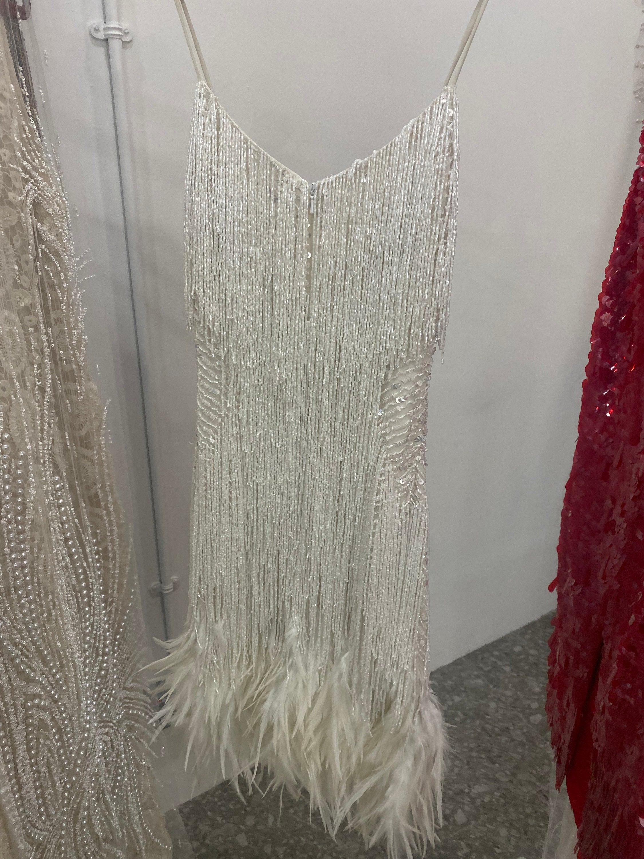 Cocktail reception Dress with couture hand embroider embroidery and real fallen feathers.