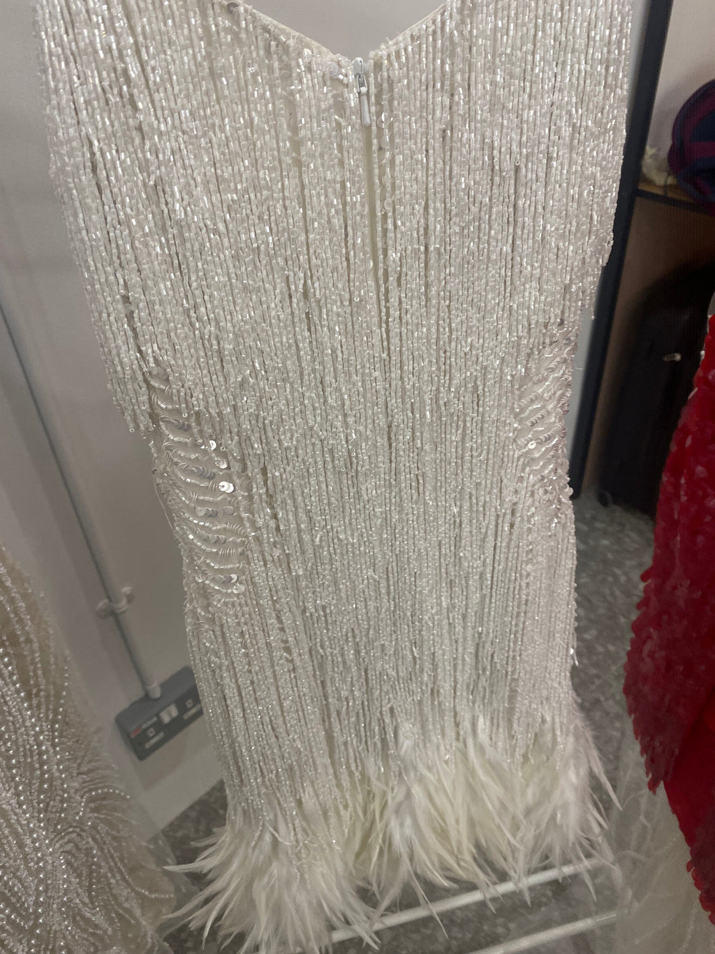Cocktail reception Dress with couture hand embroider embroidery and real fallen feathers.