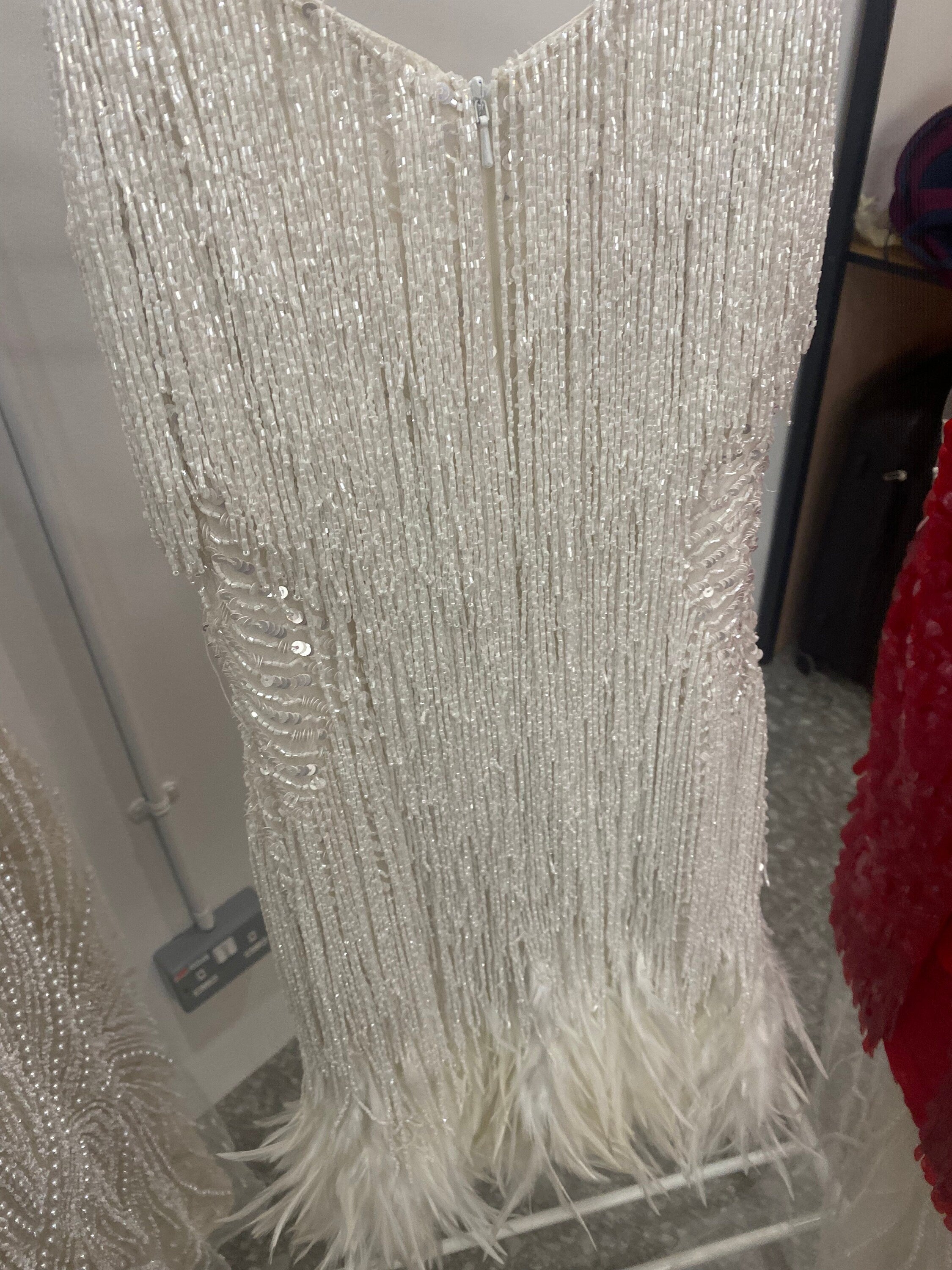 Cocktail reception Dress with couture hand embroider embroidery and real fallen feathers.