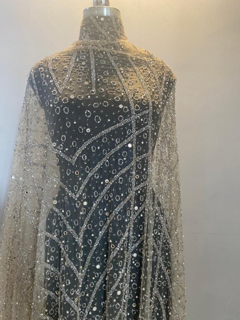 embellished fabric with beads and pearls, hand embroidered for evening gown or bridal wear