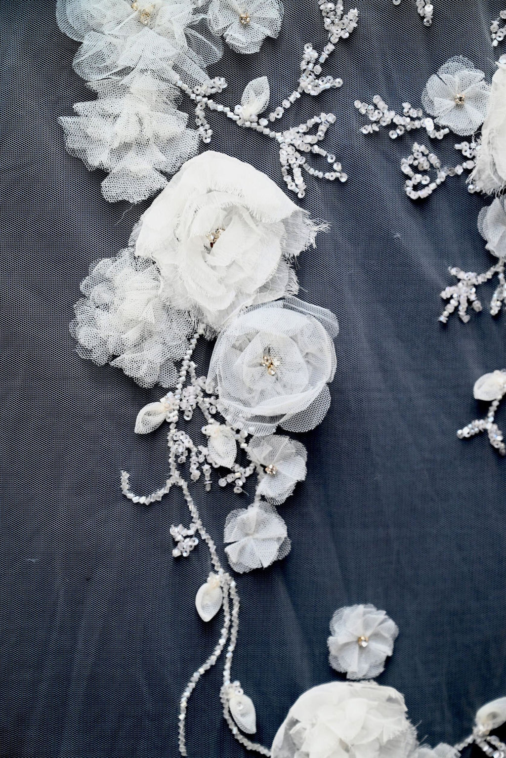 Handmade Luxurious fabric with special hand cut 3d floral applique, individually crafted for an exquisite bridal dress, gown. prom