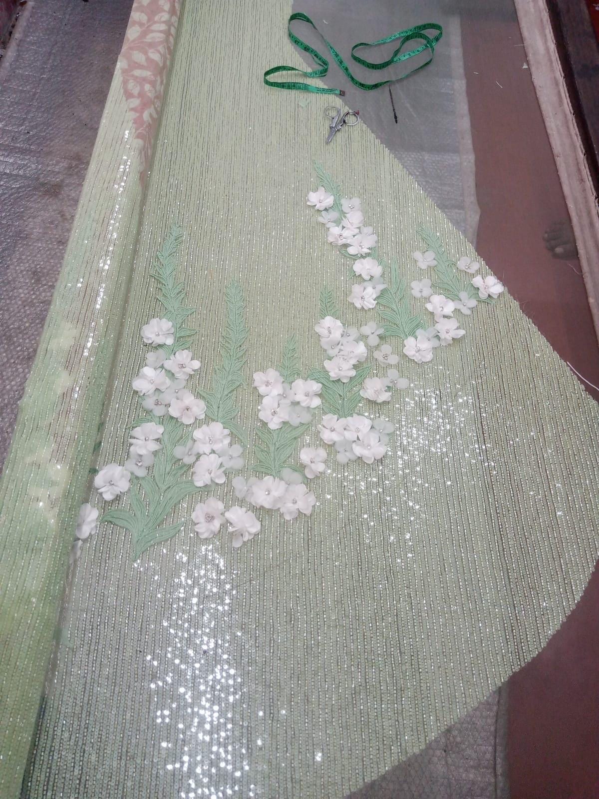 1 custom made gown embrodiery . Hand embrodiery hence some variances will occur