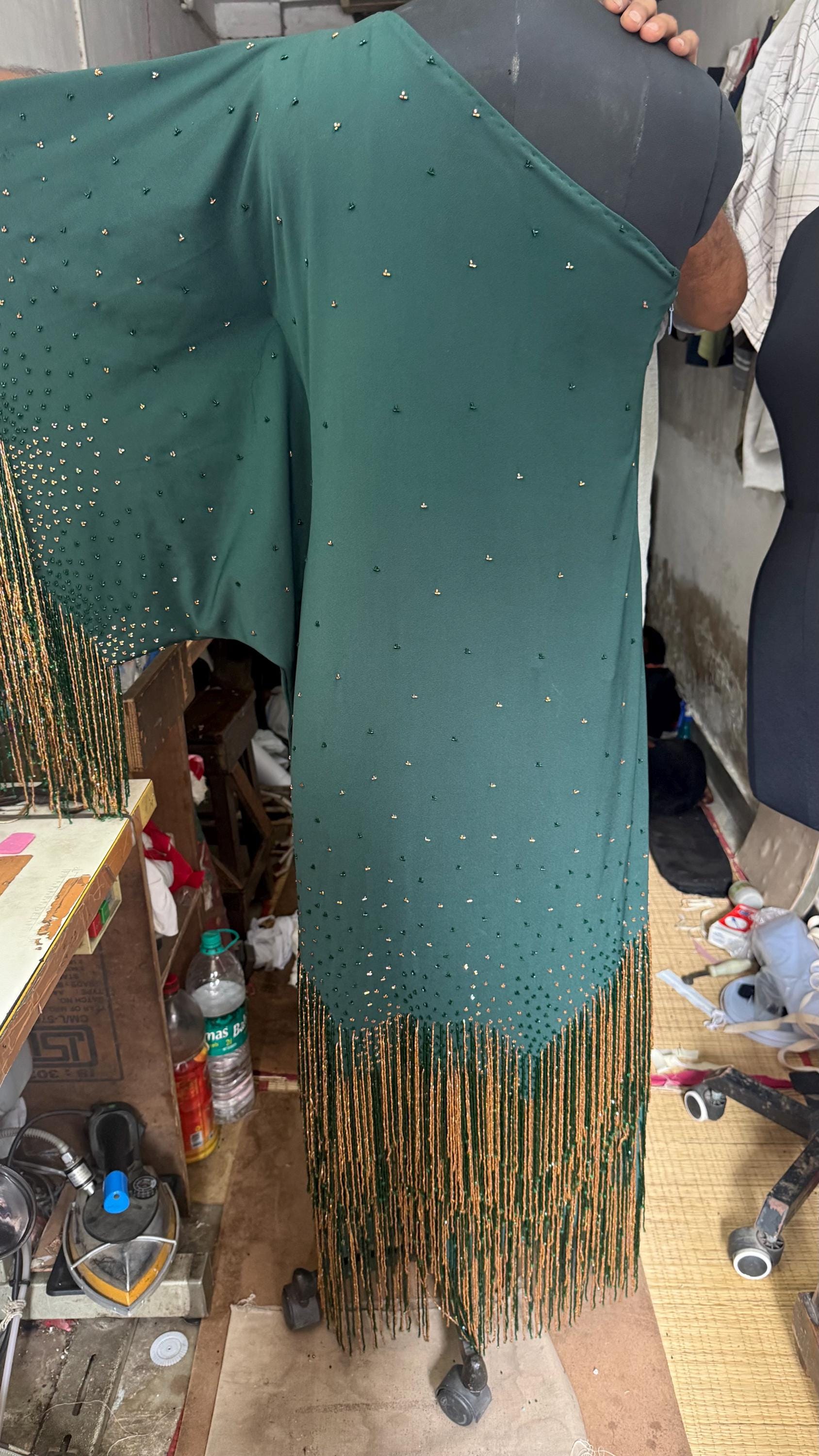 1 custom made gown embrodiery . Hand embrodiery hence some variances will occur