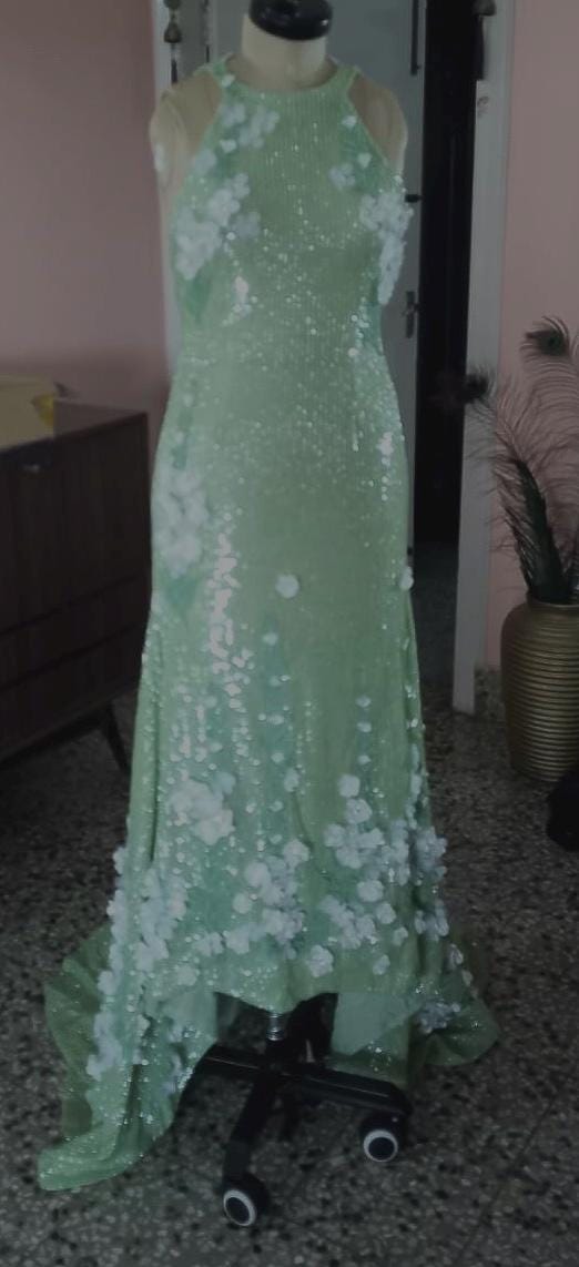 1 custom made gown embrodiery . Hand embrodiery hence some variances will occur