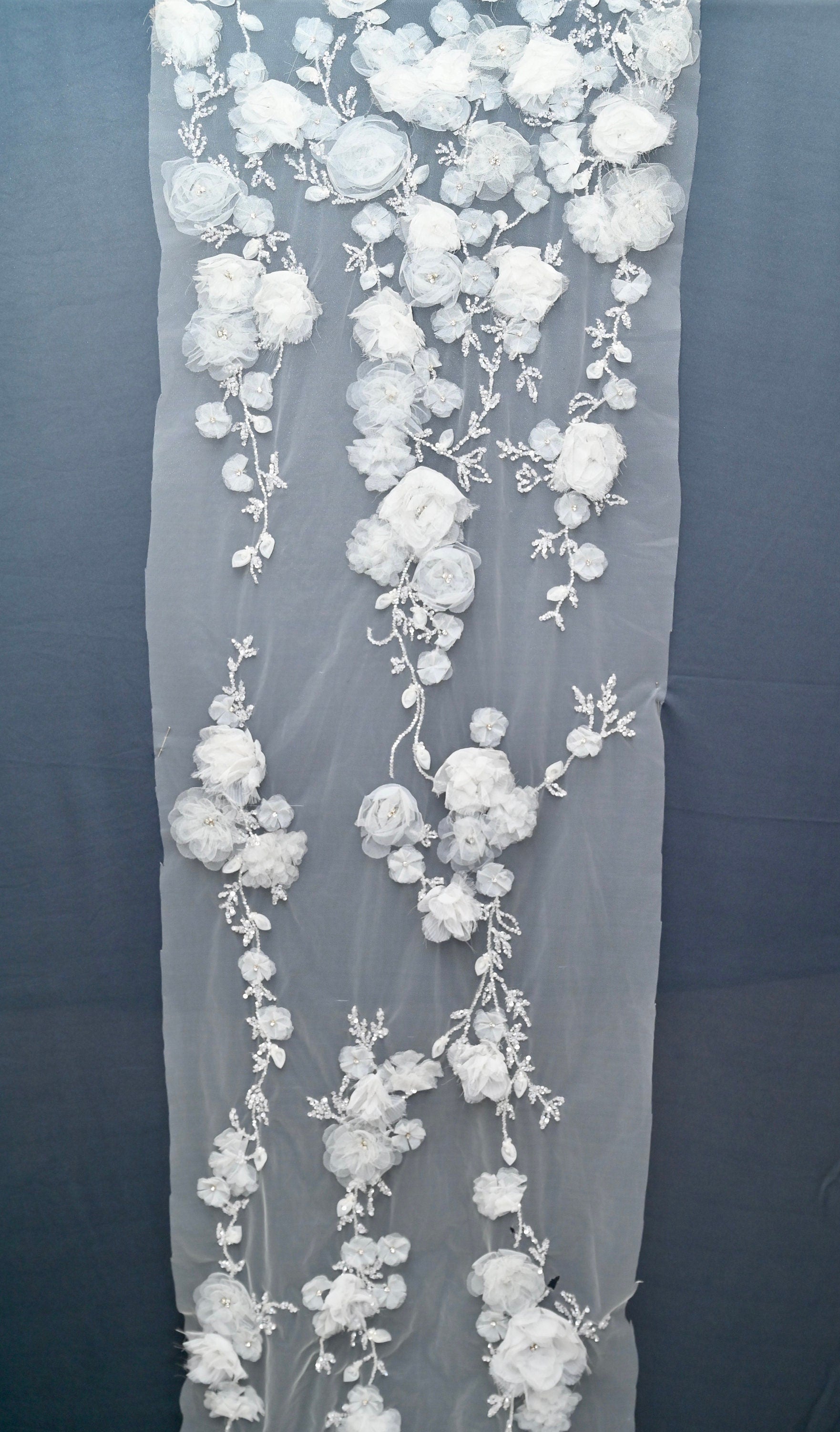 Handmade Luxurious fabric with special hand cut 3d floral applique, individually crafted for an exquisite bridal dress, gown. prom