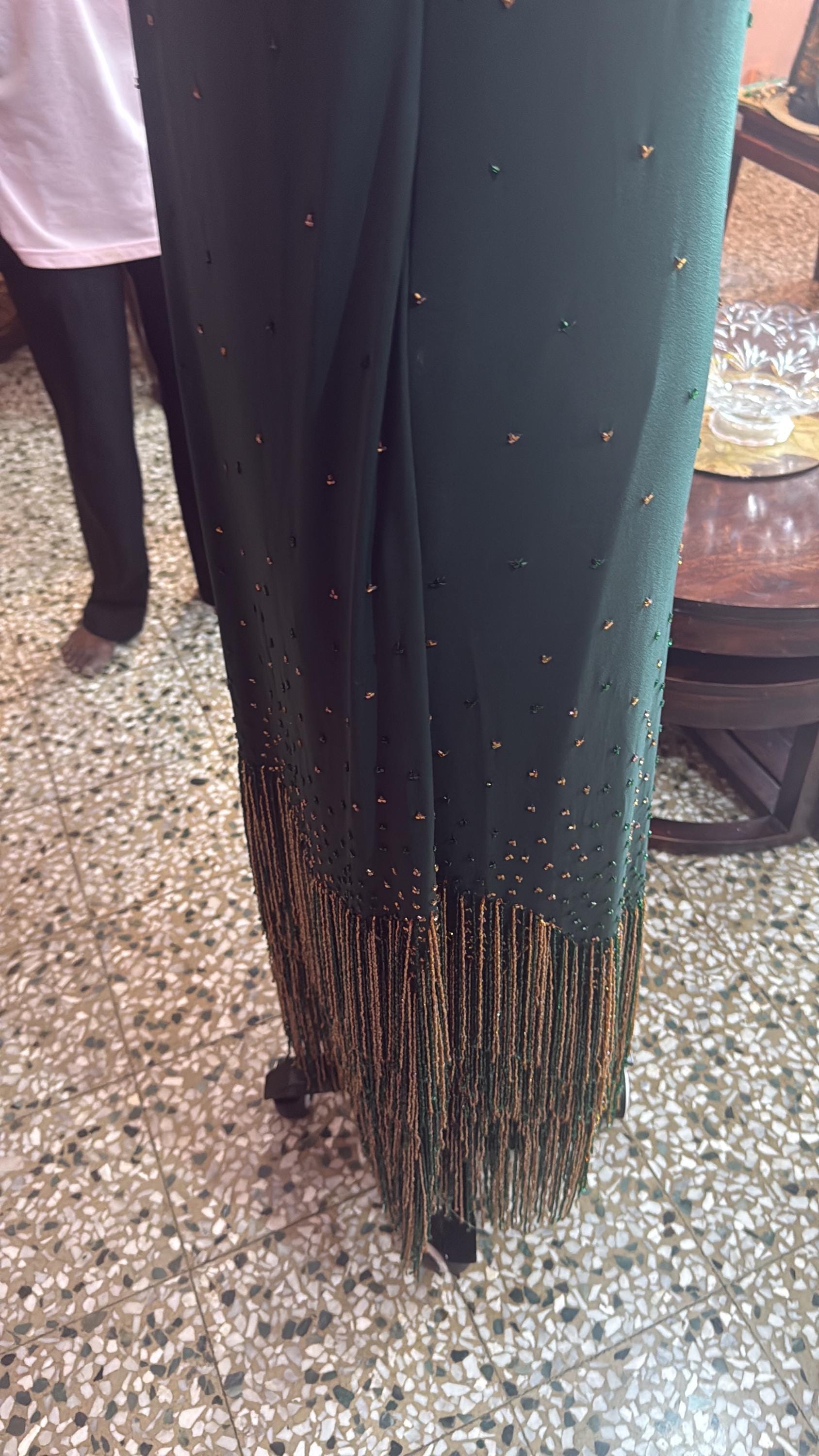 1 custom made gown embrodiery . Hand embrodiery hence some variances will occur