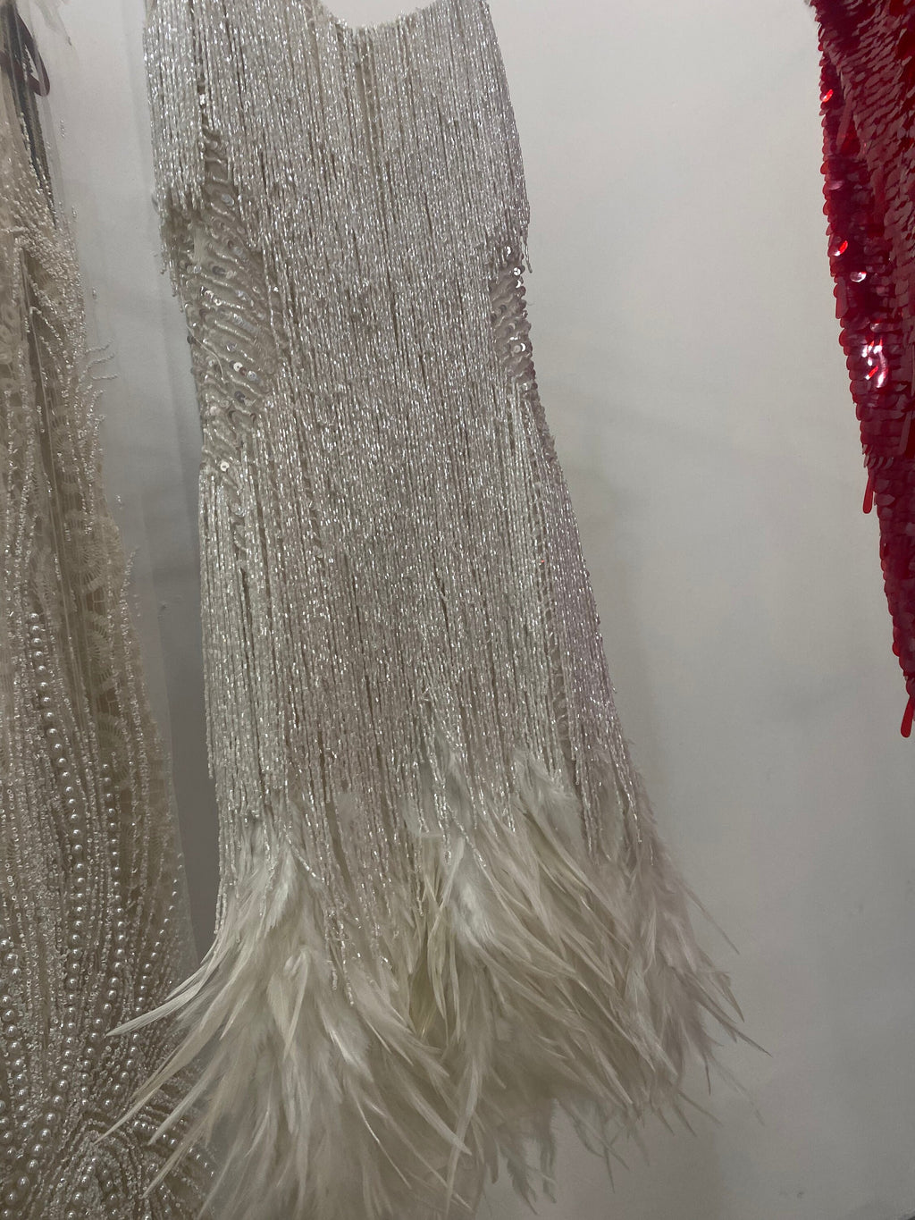 Cocktail reception Dress with couture hand embroider embroidery and real fallen feathers.