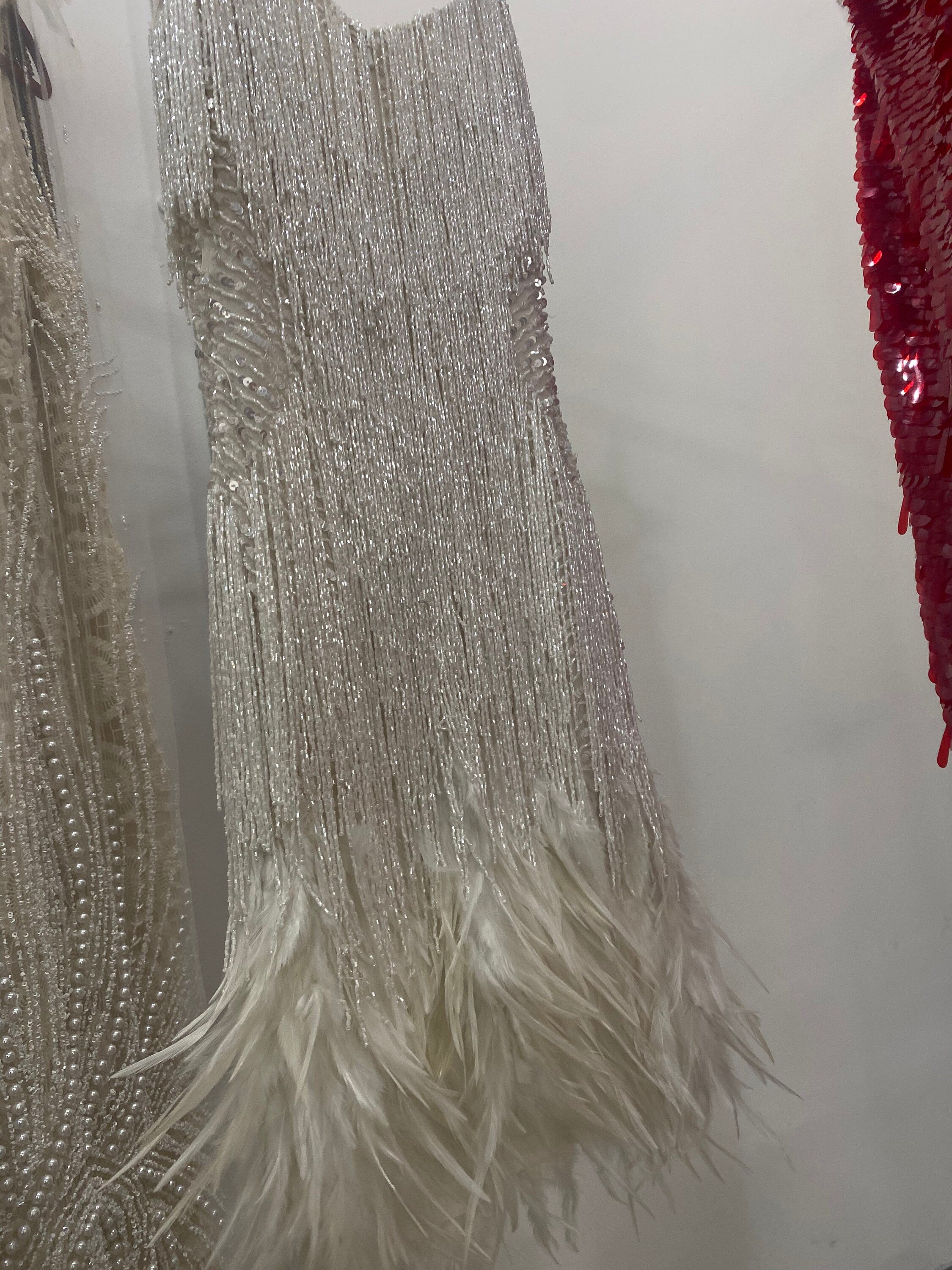 Cocktail reception Dress with couture hand embroider embroidery and real fallen feathers.